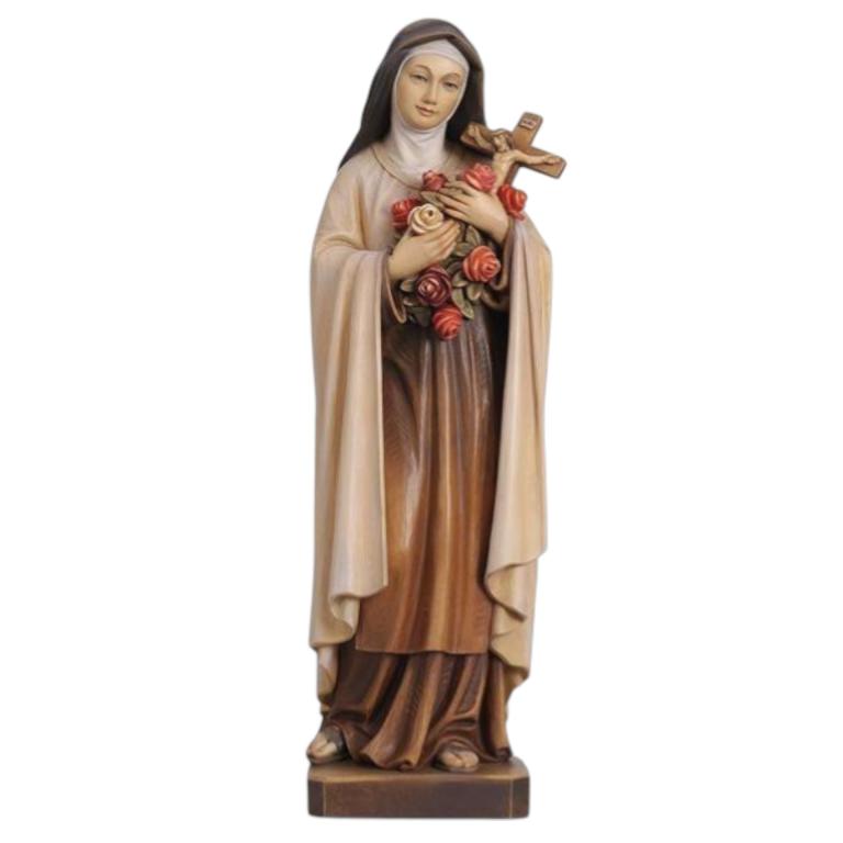 Eine religiöse Statue einer Nonne mit Kreuz und Rosen